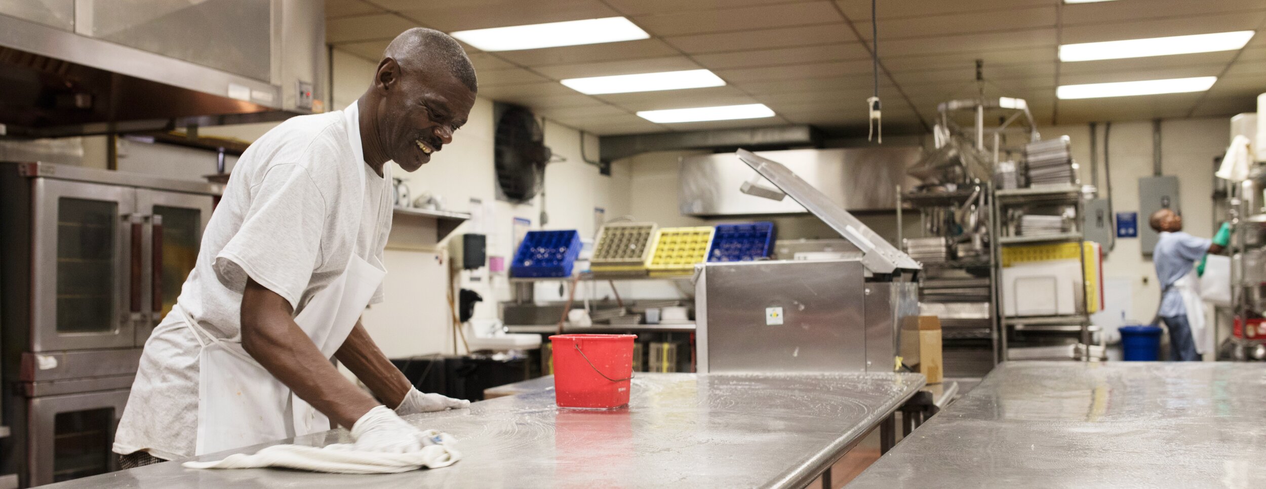 Kitchen staff cleans up after a day of cooking
