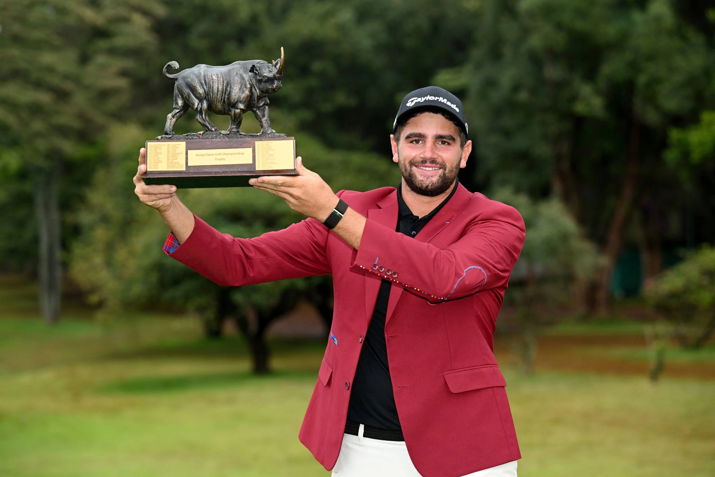 Casey Jarvis shows off the Magical Kenya Open trophy . Picture: Getty Images