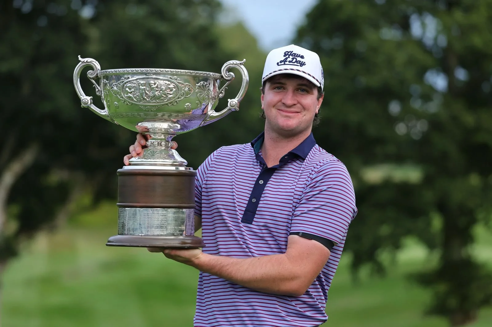 Thomas Higgins celebrates his win in the AIG Irish Men's Amateur Close Championship at Portumna. Photo: Bryan Keane / Inpho.