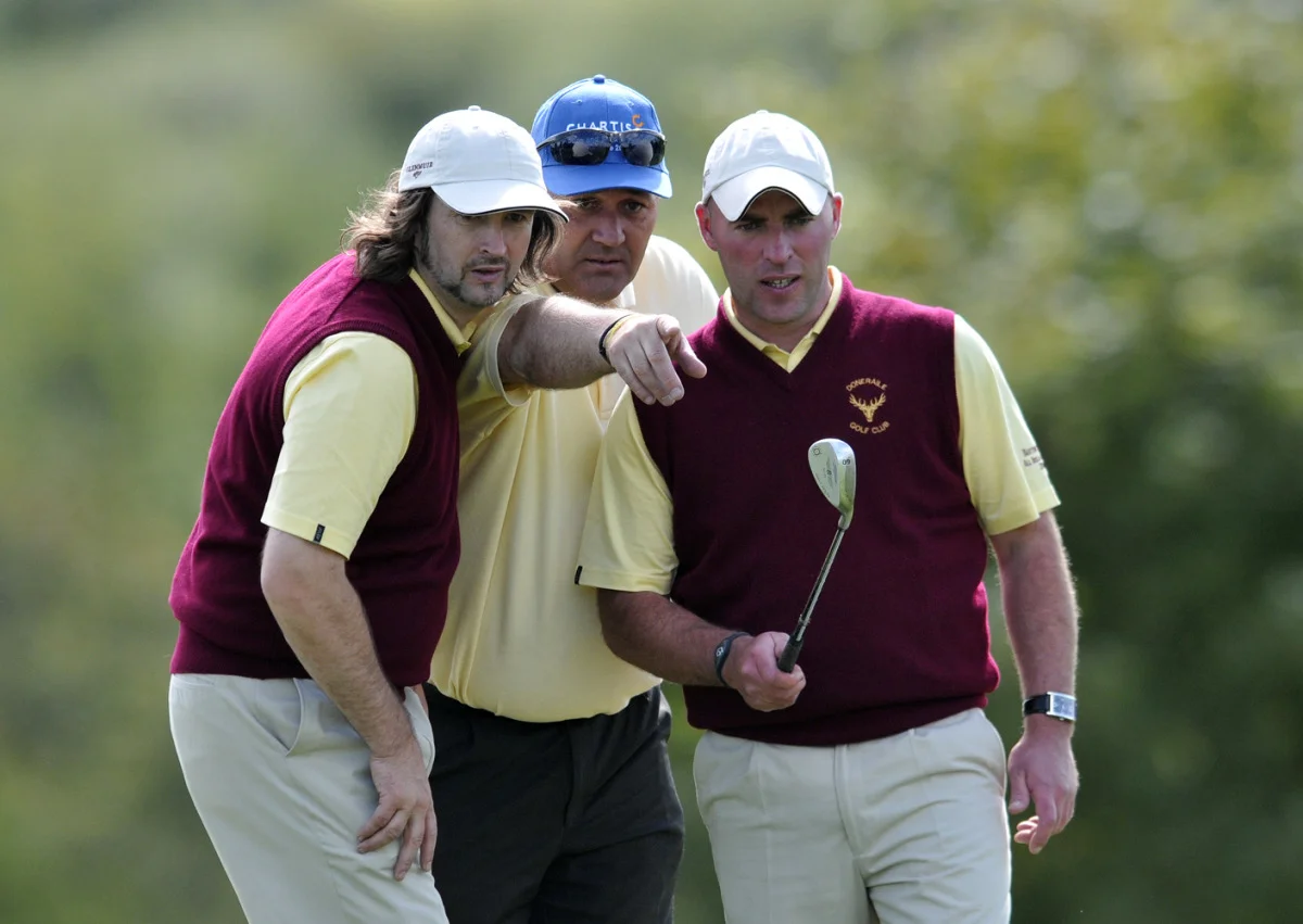 David Finn and John Hickey with Doneraile captain Tom Cole