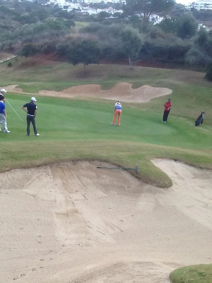 Brian Casey holes out on the final green. Picture © Tommy O'Driscoll.