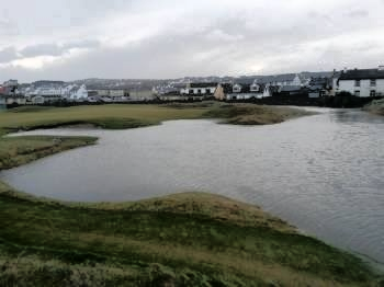 Flooding near the third tee at Lahinch. The second green is not under water but the third tee was inaccessible.