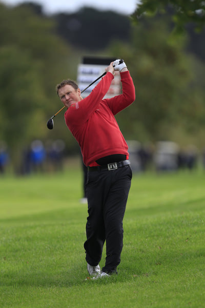  Michael McGeady hits to the 18th during the final round of the Cassidy Golf 103rd Irish PGA Championship in Roganstown Golf Club on Sunday 13th October 2013. Picture: Thos Caffrey / www.golffile.ie