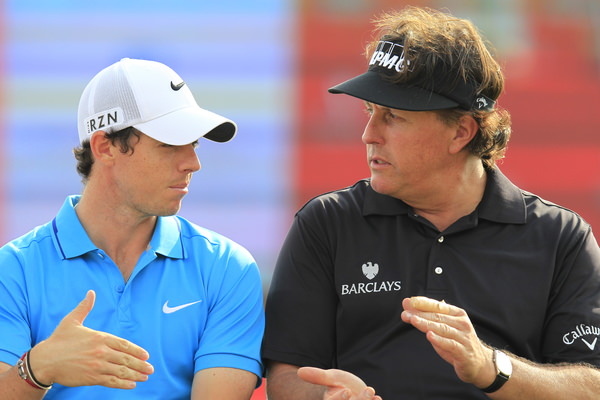 Abu Dhabi runner-up finishers Rory McIlroy and Phil Mickelson chat at the prize-giving ceremony. Picture: Eoin Clarke www.golffile.ie