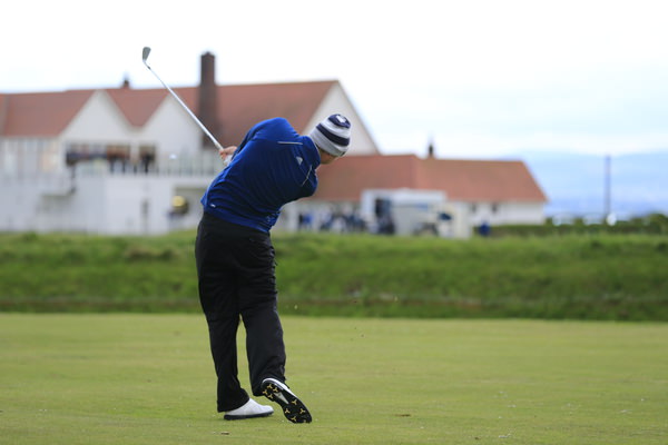 Scotland's Graeme Robertson hits to Royal Dublin's 18th in last year's Irish Amateur Open play-off, won by Balbriggan's Robbie Cannon. Players played two rounds on the final day but there will be just 18 on Sunday this year as the event moves from three to four days. Picture: Eoin Clarke www.golffile.ie
