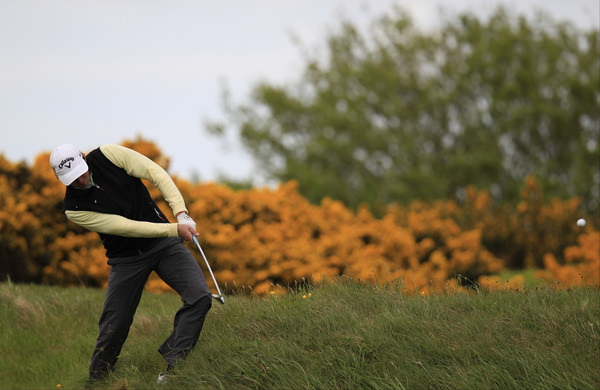  Ireland's Robbie Cannon, the eventual champion, plays his second shot from the rough on the 17th during the fourth round of the 2013 Irish Amateur Open Championship at Royal Dublin. Picture: Eoin Clarke www.golffile.ie