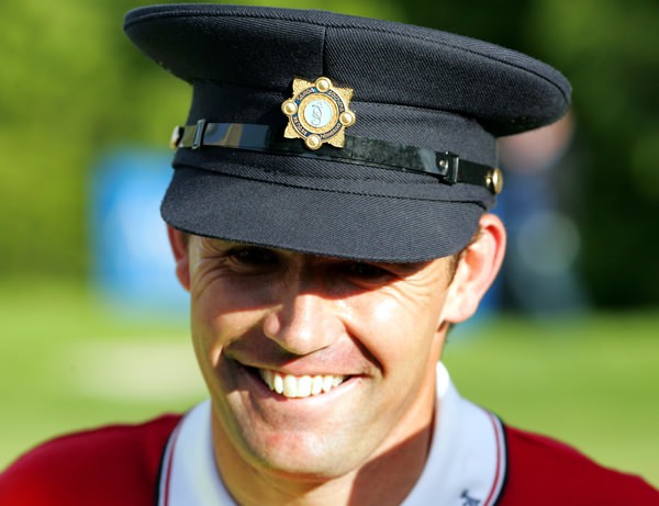 Pádraig Harrington donned a Garda's cap to celebrate his Irish Open win at Adare Manor in 2007. He'll be back in Munster for the Irish Open at Fota Island this year, hoping he's travelling there from the US Open. He is not yet qualified for the season's second major and doesn't rule out pre-qualifying at Walton Heath. Picture Manus O'Reilly www.golffile.ie