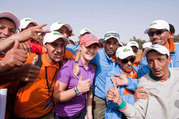 Charley Hull celebrates her maiden Ladies European Tour win with the caddies in Morocco. Picture © Ladies European Tour/Tristan Jones