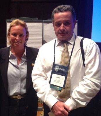 John Roche with Dottie Pepper at Junior Golf talk at a conference in Orlando earlier this year.