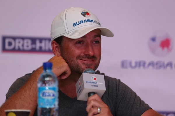 Graeme McDowell shrugged off the Tiger Woods "controversy" by joking that he "really shouldn't talk so much" when asked about it at the EurAsia Cup presented by DRB-Hicom in Kuala Lumpur, Malaysia. Picture: David Lloyd / www.golffile.ie