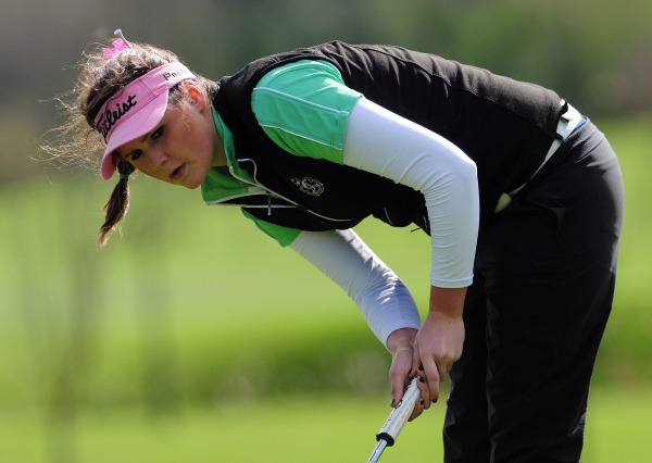 Olivia Mehaffey (Royal County Down Ladies) watching her birdie putt at the 18th green in the final round of the 2014 Irish Under 18 Girls Open Strokeplay Championship at Roganstown Golf Club today (Sunday 6th April). Picture by Pat Cashman www.cashmanphotography.ie