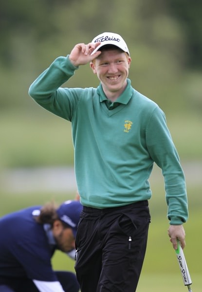 The Island's Gavin Moynihan salutes the gallery on the 18th at Carton House during last year's Irish Open. Picture: Thos Caffrey / www.golffile.ie