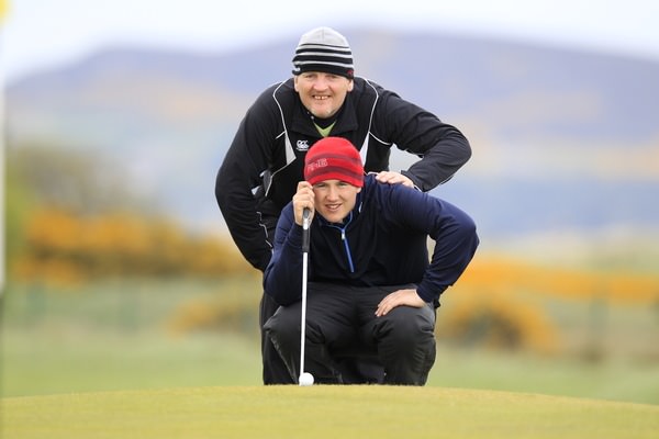 "Do you think they'll come?" Paddy Gribben and his nephew Colm Campbell are waiting to take on all comers in the Warrenpoint Senior Scratch Cup this Sunday. Pictured during the 2013 Irish Amateur Open by Eoin Clarke www.golffile.ie