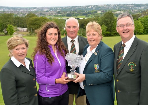 Mary McKenna (President, Irish Ladies Golf Union) presenting Lucy Goddard (England) with the 2014 Irish Women's Open Strokeplay Championship trophy after her victory at Douglas Golf Club today (Sunday 25th May).Also in the picture (from left) Bernie Watson (Lady Captain, Douglas Golf Club), Bill O'Connell (President, Douglas Golf Club) and Dermot McHugh (Captain, Douglas Golf Club). Picture: Pat Cashman cashmanphotography.ie