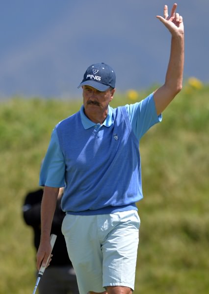 Adrian Morrow (Portmarnock) holes his putt on the 18th green to win the 2014 Irish Seniors Amateur Open Championship at Waterville. Picture by Pat Cashman cashmanphotography.ie