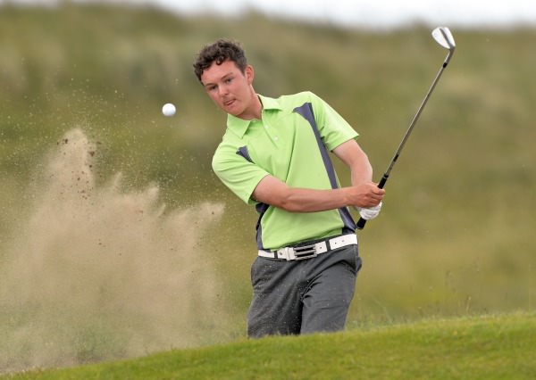 Winner John Ross Galbraith (Whitehead) blasting from the bunker at the 12th green. Picture by Pat Cashman www.cashmanphotography.ie