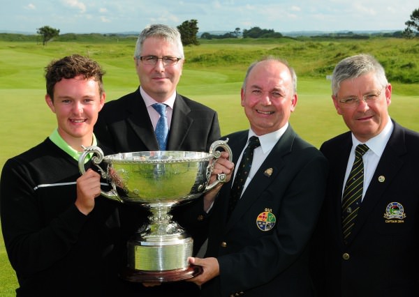 Michael Connaughton (President Elect GUI) presenting John Ross Galbraith (Whitehead) with the AIG sponsored 2014 Irish Amateur Close Golf Championship trophy.Also in the picture are John Boylan (Motor Manager, AIG Europe Limited) and Dan Reynolds (Captain, Seapoint Golf Club). Picture by Pat Cashman