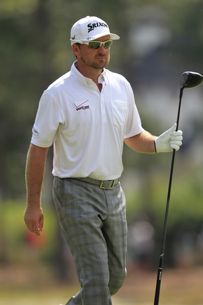 A focussed looking Graeme McDowell walks off the second tee. Picture: Eoin Clarke www.golffile.ie