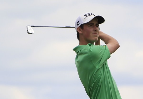 Gary Hurley hits at the par three 7th during round three of the Irish Open at Fota Island. Picture: Thos Caffrey / www.golffile.ie