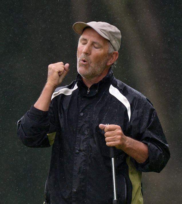 John L Hughes (Woodbrook) has that winning feeling after sinking his final putt on the 18th green to win the 2014 Leinster Seniors Open Championship at Forrest Little Golf Club today (25/06/2014). Picture by Pat Cashman / www.cashmanphotography.ie