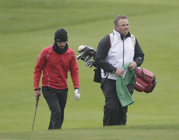 Dara Lernihan, pictured with his young caddie Shane Lowry during last year's Irish PGA at Roganstown, leads the Johnston Mooney & O'Brien PGA Challenge at Carton House. Picture Picture Fran Caffrey www.golffile.ie