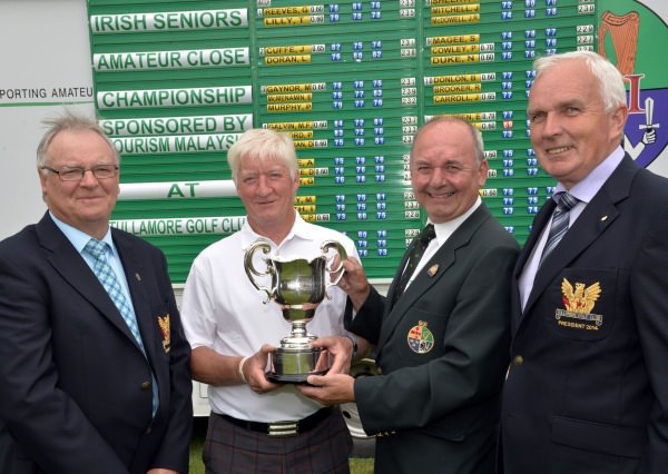 Michael Connaughton (President Elect, Golfing Union of Ireland) presenting Maurice Kelly (Naas) with the 2014 Tourism Malaysia sponsored Irish Seniors Amateur Close Championship trophy after his victory at Tullamore. Also pictured are Joe Feely (Captain, Tullamore Golf Club) and Willie O'Grady (President, Tullamore Golf Club). Picture by Pat Cashman www.cashmanphotography.ie