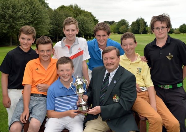 Kevin McIntyre (Chairman, Leinster Golf, Golfing Union of Ireland) presenting Scott Miller (Clandeboye) with the Leinster Boys' Under 13 Open Championship trophy after his victory at Corrstown Golf Club (21/07/2014). Also in the picture are fellow prizewinners Shane Irwin (Killeen), Joshua McCabe (Roganstown), Robert Galligan (Elm Park), Peter Taylor (Tandragee), Sean Doyle (Black Bush) and Patrick Callaghan (Castle Dargan). Picture by Pat Cashman