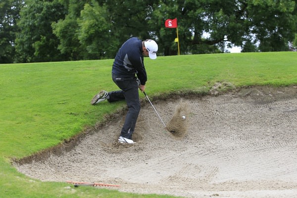 Richard Knightly (Royal Dublin) plugged in a bunker on the par-three second during round 1 of the Mullingar Electrical Scratch Trophy at Mullingar Golf Club on Sunday 3rd August 2014. Picture: Thos Caffrey / www.golffile.ie