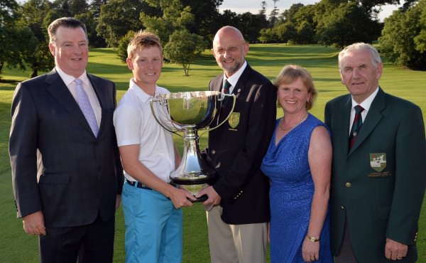 John O'Reilly (Captain, Mullingar Golf Club) presenting Geoff Lenehan (Portmarnock) with the Mullingar Electrical Scratch Cup after his victory at Mullingar Golf Club. (Monday 04/08/2014). Also in the picture are (from left) Peader Conlon (sponsor), Ann Marie Conlon (sponsor) and Albert Lee (Chairman, Scratch Cup Committee). Picture by Pat Cashman