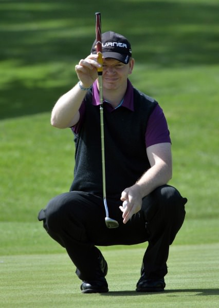 Winner Simon Miskelly (Knock) lining up his putt at the 18th green in the final round of the 2014 Leinster Mid Amateur Open Championship at the Grange Golf Club today (09/08/2014). Picture by Pat Cashman 