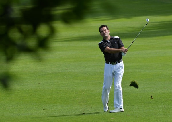 Gary O'Flaherty (Cork) playing his second shot at the 18th in the final round of the 2014 Leinster Mid Amateur Open Championship at the Grange Golf Club today (09/08/2014). Picture by Pat Cashman 