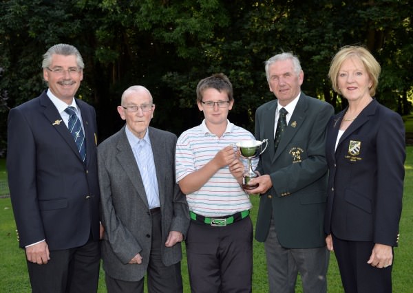 Albert Lee (Hon Secretary, GUI) presenting Patrick Callaghan (Castle Dargan) with the 2014 Irish Boys Under 13 Amateur Open Championship trophy (Craddock Cup) after his victory at Malahide Golf Club (11/08/2014). Also in the picture are (from left) Tommy Rusk (Captain, Malahide Golf Club), Paddy Craddock and Pauline Chawke- Clancy (Lady Captain, Malahide Golf Club), Picture by Pat Cashman 