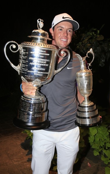 Rory McIlroy holds the Wanamaker Trophy and the Claret Jug. Picture Eoin Clarke, www.golffile.ie