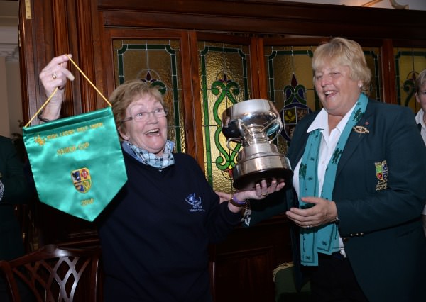 Mary McKenna (President, Irish Ladies Golf Union) presenting Laytown & Bettystown Aileen Regan (Team Captain) with the 2014 AIG All Ireland Ladies Senior Cup trophy and pennant after their victory at Mount Wolseley Country Club. (16/08/2014). Picture by Pat Cashman