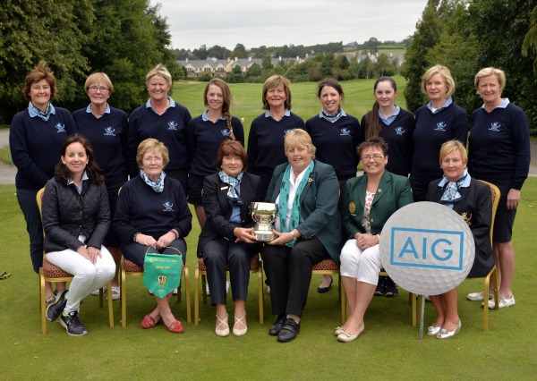 Mary McKenna (President, Irish Ladies Golf Union) presenting Millie Wade (Lady Captain, Laytown & Bettystown Golf Club) with the 2014 AIG All Ireland Ladies Senior Cup trophy after their victory at Mount Wolseley Country Club today (16/08/2014). In front (from left) Claire Scanlon (Business Development Manager, AIG Ireland), Aileen Regan (Team Captain), Eilish Hanley (Lady Captain, Mount Wolseley Golf Club) and Hazel Lee (Lady President, Laytown & Bettystown Golf Club). At back (from left) Alison Taylor, Rita O'Connor, Phil O'Gorman, Rachel Taylor, Patricia McAllister, Barbara Cooney, Ellie Metcalfe, Noeline Quirke and Carol Wickham. Picture by Pat Cashman