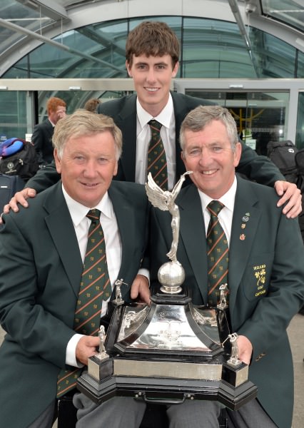 Irish Captain Padraig Hogan with manager John Carroll (Bandon) and Gary Hurley (West Waterford) with the Raymond Trophy. Picture by Pat Cashman