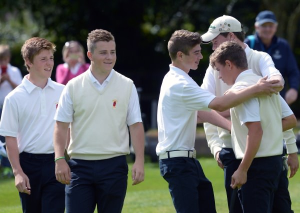 Team members congratulate Jack Madden (Ulster) on securing a half match to win the 2014 Irish Boys Under 15 Interprovincial title at Castlewarden Golf Club today (22/08/2014). Picture by Pat Cashman