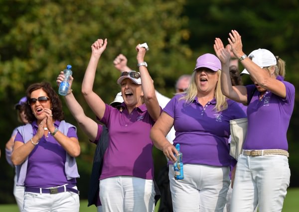 Waterford Castle Golf Club supporters celebrate their win on the 16th green during the semi final of the I Need Spain Irish Mixed Foursomes at Warrenpoint Golf Club (04/09/2014). Picture by Pat Cashman