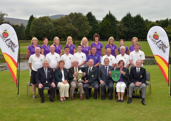 Michael Connaughton (President Elect, Golfing Union of Ireland) presenting Pat Crowley (Captain, Waterford Castle Golf Club) with the I Need Spain Irish Mixed Foursomes trophy after their victory at Warrenpoint Golf Club today (05/09/2014). Also in the picture in front are (from left) John Moloughney (Chairman, Munster Branch, GUI), Joyce Hughes (Hon Sec. Ulster Branch, ILGU), Gonzalo Ceballos (Spanish Tourism Board), Sheelagh Browne (Lady Captain, Waterford Castle Golf Club) and Finn Sherry (Captain, Warrenpoint Golf Club). Middle (from left) Liam Coady, Denny Sinnott, Sam Power, Niall O'Connell, Paul Greene (Team Manager), Pat Madigan, Francis Reynolds and Ben Murray. At back (from left) Sally Brennan, Fiona Fitzgerald, Mary Madigan, Bridget Tierney, Patsy Garry, Anna Galvin, Deirdre McCarthy and Phyllis Sinnott. Picture by Pat Cashman