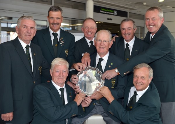 European Seniors Champions. Irish Seniors Team Captain Tony Goode (Lucan) with the 2014 European Senior trophy and team members (clockwise) Team Manager Albert Lee (Mullingar), Adrian Morrow Portmarnock), Tom Cleary Cork), Michael Quirke (Doneraile), John Mitchell (Tramore), Arthur Pierse (Tipperary) and Maurice Kelly (Naas) on their return to Dublin Aiport (07/09/2014) after their victory in Poland. Picture by Pat Cashman