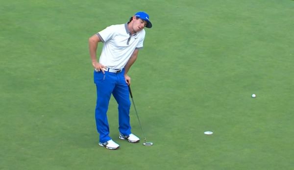 Rory McIlroy reacts to missing his third putt on the 12th He had to hole a four footer to avoid a five-putt. 