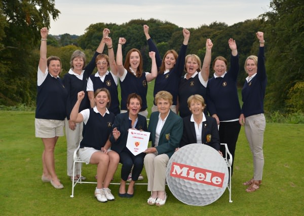 Vonnie Noonan (ILGU Board Member) presenting Marie Clifford (Lady Captain, City of Derry Golf Club) with the 2014 Miele All Ireland Ladies Interclub Fourball Regional Final pennant after their victory at Athlone Golf Club. Also in the picture in front are Ciara Quigg (Team Manager) and Lily O'Sullivan (Lady Captain, Athlone Golf Club). At back (from left) Vivienne Houston, Maire McReynolds, Betty McBride, Catherine McCanny, Naoimh Quigg, Geraldine Crossan, Jenny Flanagan and Gerda Laird. Picture by Pat Cashman
