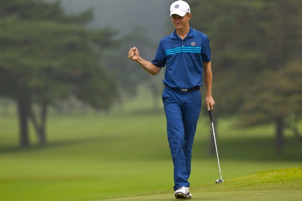 Marcus Kinhult of Sweden, reacts after sinking his birdie putt at the ninth hole (Iriyama Course), during the first round at the 2014 Eisenhower Trophy at Karuizawa 72 Golf East in Karuizawa, Japan on Wednesday, Sept. 10, 2014. © USGA/Steven Gibbons