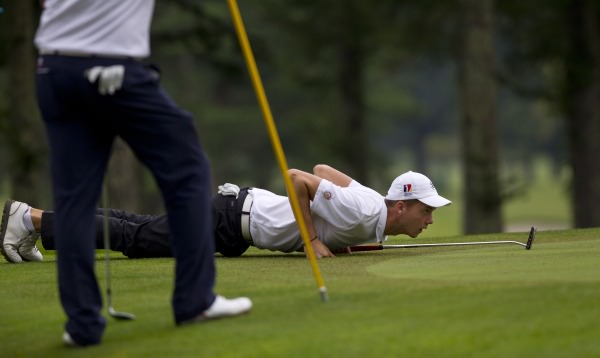 Maximilian Mehles of Germany goes low to scout his putt at the 18th green, (Iriyama Course), during the second round at the 2014 Eisenhower Trophy at Karuizawa 72 Golf East in Karuizawa, Japan on Thursday, Sept. 11, 2014. © USGA/Steven Gibbons