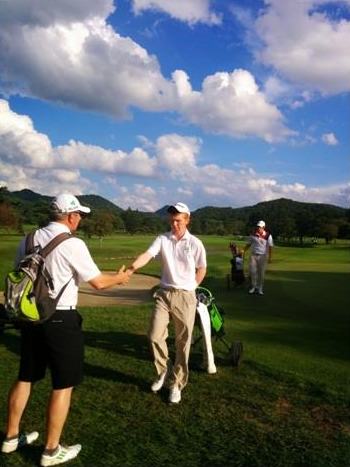Gavin Moynihan (The Island) is congratulated by captain Padraig Hogan (Elm Park) following his superb 7 under par 64 in the World Amateur Amateur Team Championship. Picture: facebook.com/leinstergolfgui/