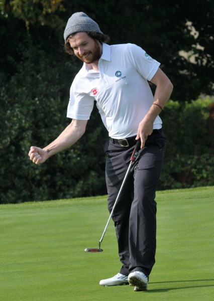 Hat's the way to do it. Ryan Gribben (Warrenpoint) holes the winning putt on the 20th green in the semi final of the AIG Barton Shield at Carton House today (17/09/2014). Picture by Pat Cashman