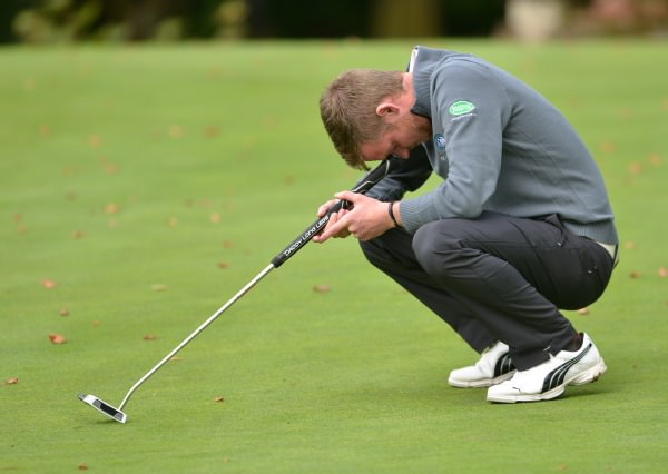 Stephen Coulter (Warrenpoint) reacts to a missed putt on the 16th green in the final of the AIG Barton Shield at Carton House today (18/09/2014). Picture by Pat Cashman