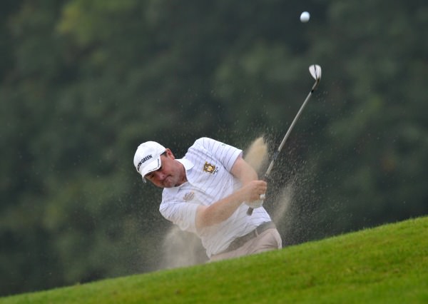 Paul Flynn (Tramore) plays from a bunker at the 19th hole in the semi final of the AIG Senior Cup at Carton House today (19/09/2014). Picture by Pat Cashman