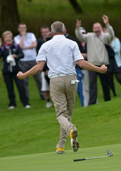 Tramore's Alan Thomas holes his birdie putt on the 19th green to clinch the AIG Senior Cup at Carton House today (20/09/2014). Picture by Pat Cashman