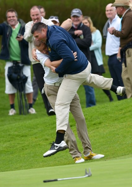 Tramore's Alan Thomas (left) celebrates with Chris Butler after he holes his birdie putt on the 19th to clinch the AIG Senior Cup at Carton House today (20/09/2014). Pictures by Pat Cashman